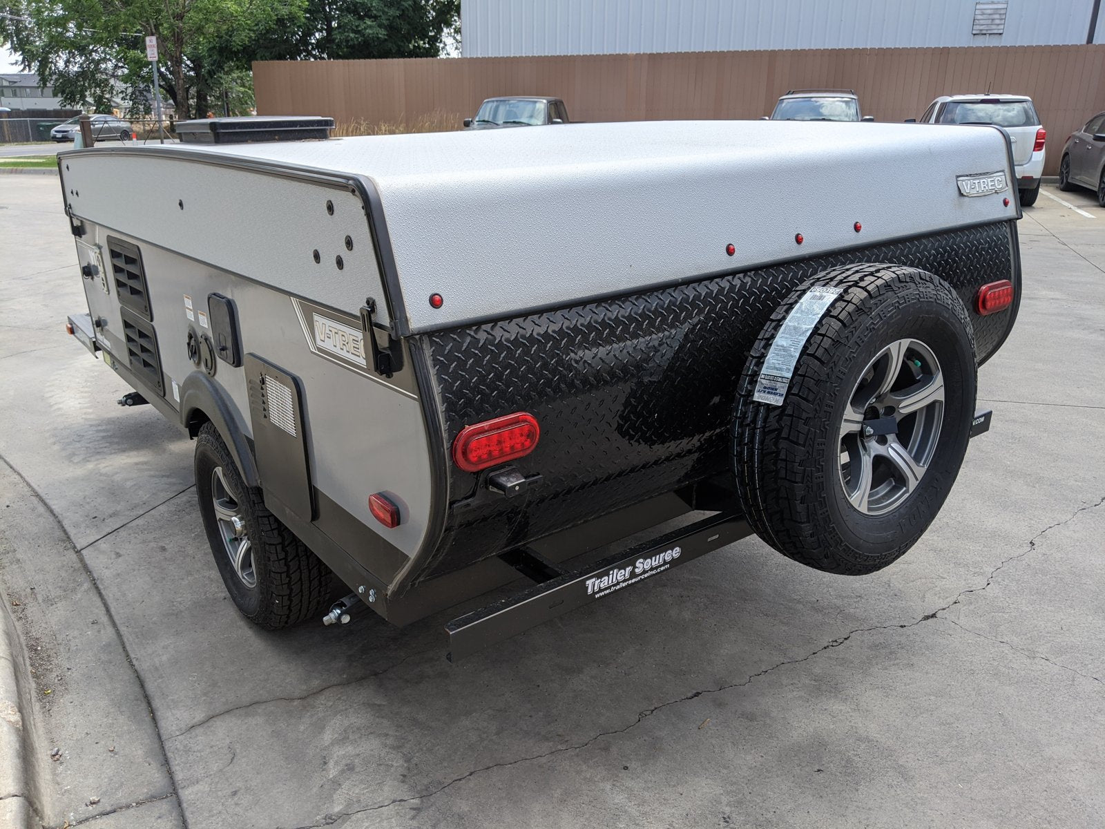 Black embossed diamond plate rock guard on a pop-up camper trailer