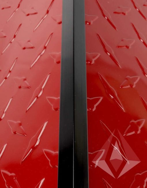 Black Aluminum Outside corner trim molding installed on red aluminum diamond plate panels
